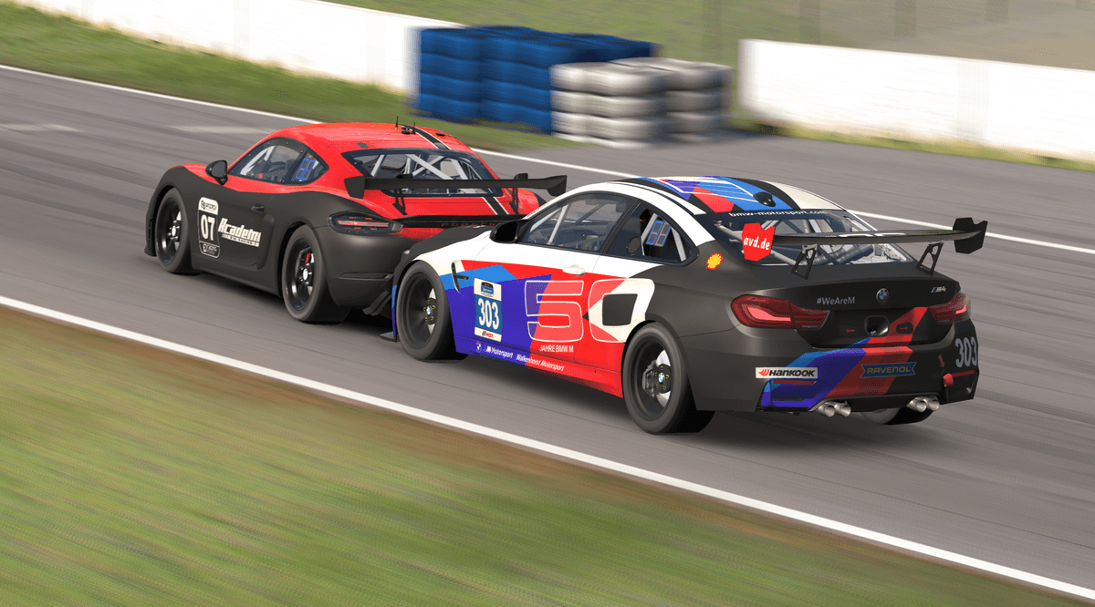 GT4 cars racing side-by-side
